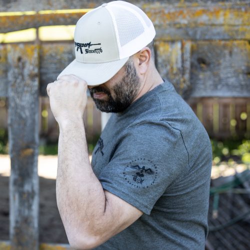 Freedom Rifle mens olive sleeve Man wearing olive green Freedom Rifle T-shirt from United States of American's Republic USOAR