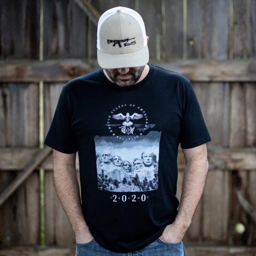 Man wearing black Mt. Rushmore T-shirt from United States of American's Republic USOAR