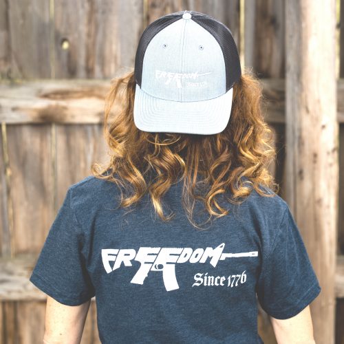 Peace Through Strength women twilight back Woman wearing twilight blue Peace Through Strength T-shirt from United States of American's Republic USOAR