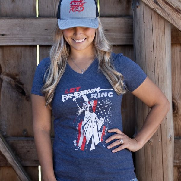 Woman wearing a blue Let Freedom Ring USOAR T-Shirt from United States of American's Republic