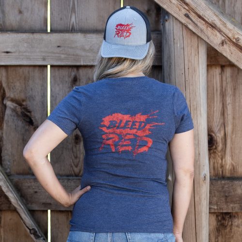 Woman wearing a blue Let Freedom Ring USOAR V-neck T-Shirt from United States of American's Republic